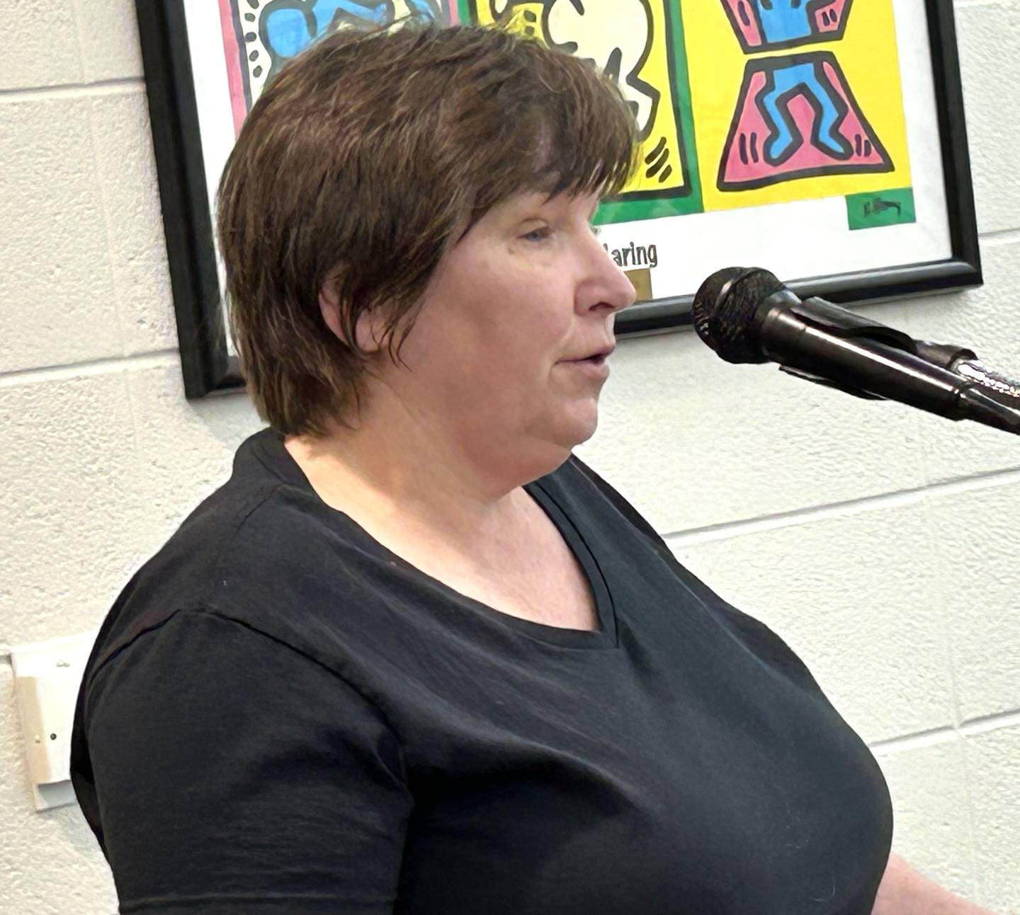 Jane Koeller speaks at the April 15, 2026 public hearing about a proposed $10 million sports complex addition for  the Forreston Junior Senior High School. The purpose of the hearing was to receive public comment regarding a proposal to sell bonds to fund the addition.