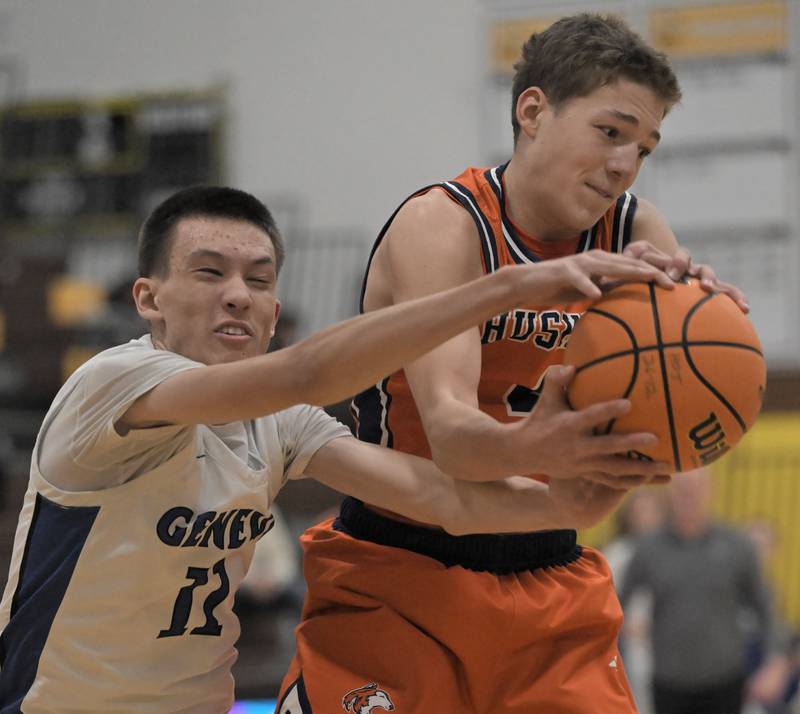 Geneva’s Kyle Suger loses a rebound to Naperville North’s Miles Okyne in a boys basketball game at the Jacobs Hinkle Classic semifinals in Algonquin on Tuesday, Dec. 23, 2025.