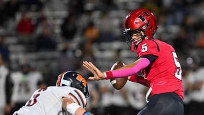 Malik Carter throws 5 TDs, Huntley tops McHenry to keep playoff hopes alive 