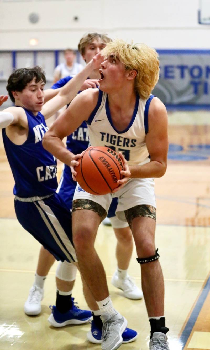 Princeton's Noah LaPorte eyes the bucket against Newman Tuesday at Prouty Gym. He scored 29 points to lead the Tigers to a 59-54 win.