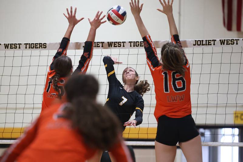 Joliet West’s Gabby Piazza goes up for the kill against Lincoln-Way West on Tuesday, Sept. 12, in Joliet.