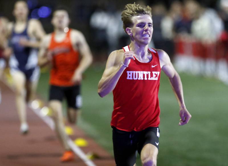 Huntley’s Tommy Nitz races to the finish line to win the 1600 meter run during the Huntley IHSA Class 3A Boys Sectional Track and Field Meet on Thursday, May 22, 2025, at Huntley High School.