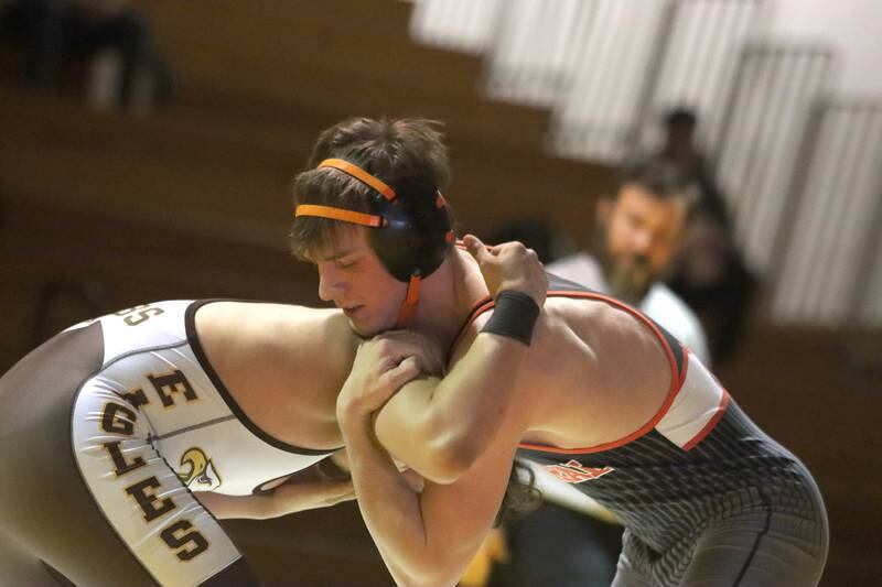 Jacobs’ Hugo Prado, left, battles Crystal Lake Central’s Tommy Tomasello at 165 pounds in varsity wrestling on Thursday, Jan. 16, 2025, at Jacobs High School in Algonquin.