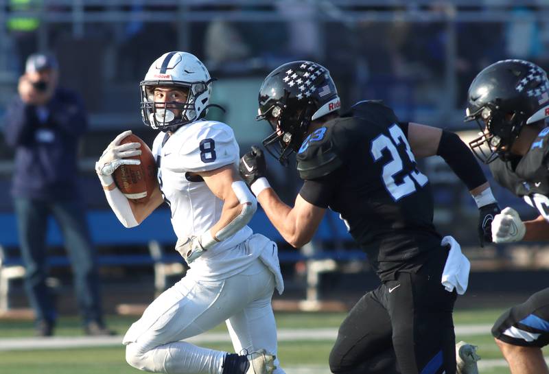 Cary-Grove’s Andrew Prio breaks for the end zone on a touchdown against Highland Park in second-round IHSA Class 6A playoff action at Wolters Field in Highland Park Saturday.