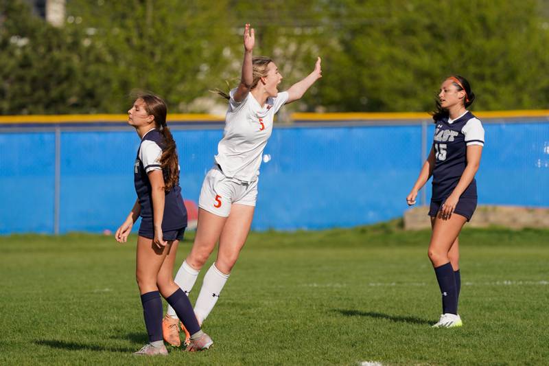 Oswego’s Aubrey Eirich (5) reacts after scoring a goal against Oswego East during a soccer match at Oswego East High School on Tuesday, April 23, 2024.