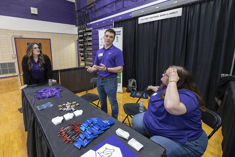 Noah Grot, representative for First National Bank of Amboy, talks about the bank Wednesday, March 11, 2026, during the career fair at Dixon High School.