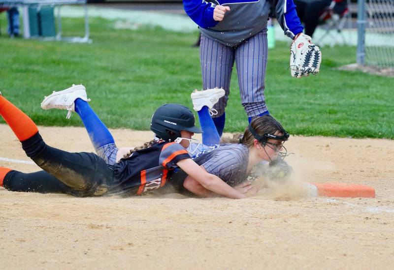Princeton second baseman Sylvie Rutledge doubles off Kewanee's Abby Gerard off first base after catching a line drive in the second inning in Thursday's game at Little Siberia. Kewanee won the game 6-2.