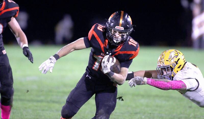Crystal Lake Central’s Griffin Buehler runs the ball against Jacobs in varsity football at Metcalf Field on the campus of Crystal Lake Central Friday night.