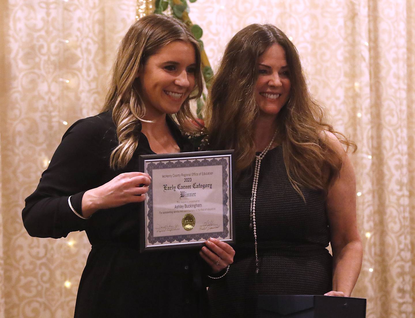 Ashley Buckingham of Westwood Elementary School poses for a photograph with Diana Hartmann, the McHenry County Regional Superintendent of Schools, during the the Educator of the Year Dinner, Saturday, May 6, 2023, at Hickory Hall, in Crystal Lake. The annual awards recognize McHenry County’s top teachers, administrators and support staff.