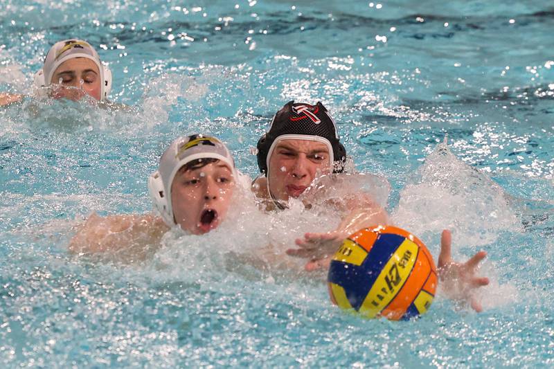Bradley-Bourbonnais' Zach Morrey races for possession against Andrew's Simonas Rimskis during the Boilermakers' 15-4 loss to the Thunderbolts on Thursday, March 20, 2025.