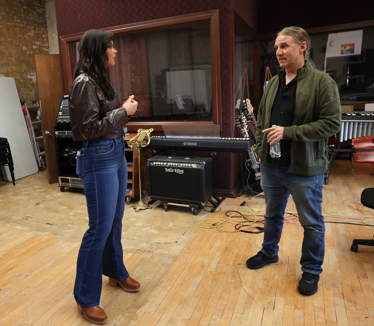 Olivia Minogue, who just finished competing on The Voice, talks with music producer and educator Alby Odum, who she is working with, at the DARA studio at St. Francis on Thursday, Nov. 9, 2023 in Joliet.