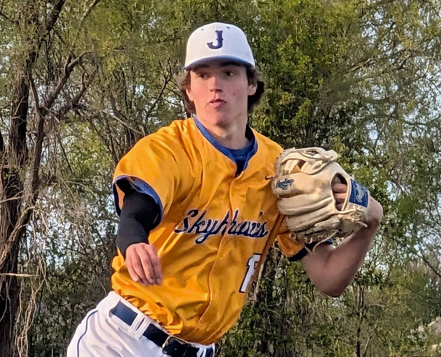 Johnsburg's Ashton Stern delivers a pitch against Harvard on Wednesday, May 7, 2025 at Johnsburg. The Skyhawks won 14-0 in five innings to capture the Kishwaukee River Conference championship.