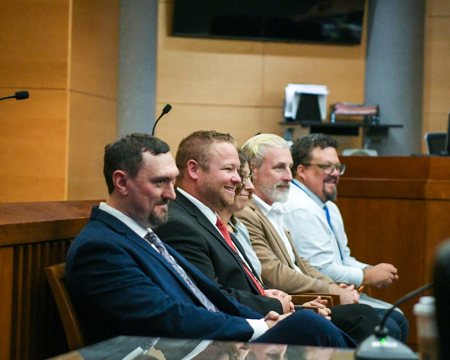 Members of the Kane County Veterans Treatment are all smiles as they look on during the Veterans Treatment Court graduation ceremony held on Monday Sept. 22, 2025, held at the Kane County Judicial Center in St. Charles.