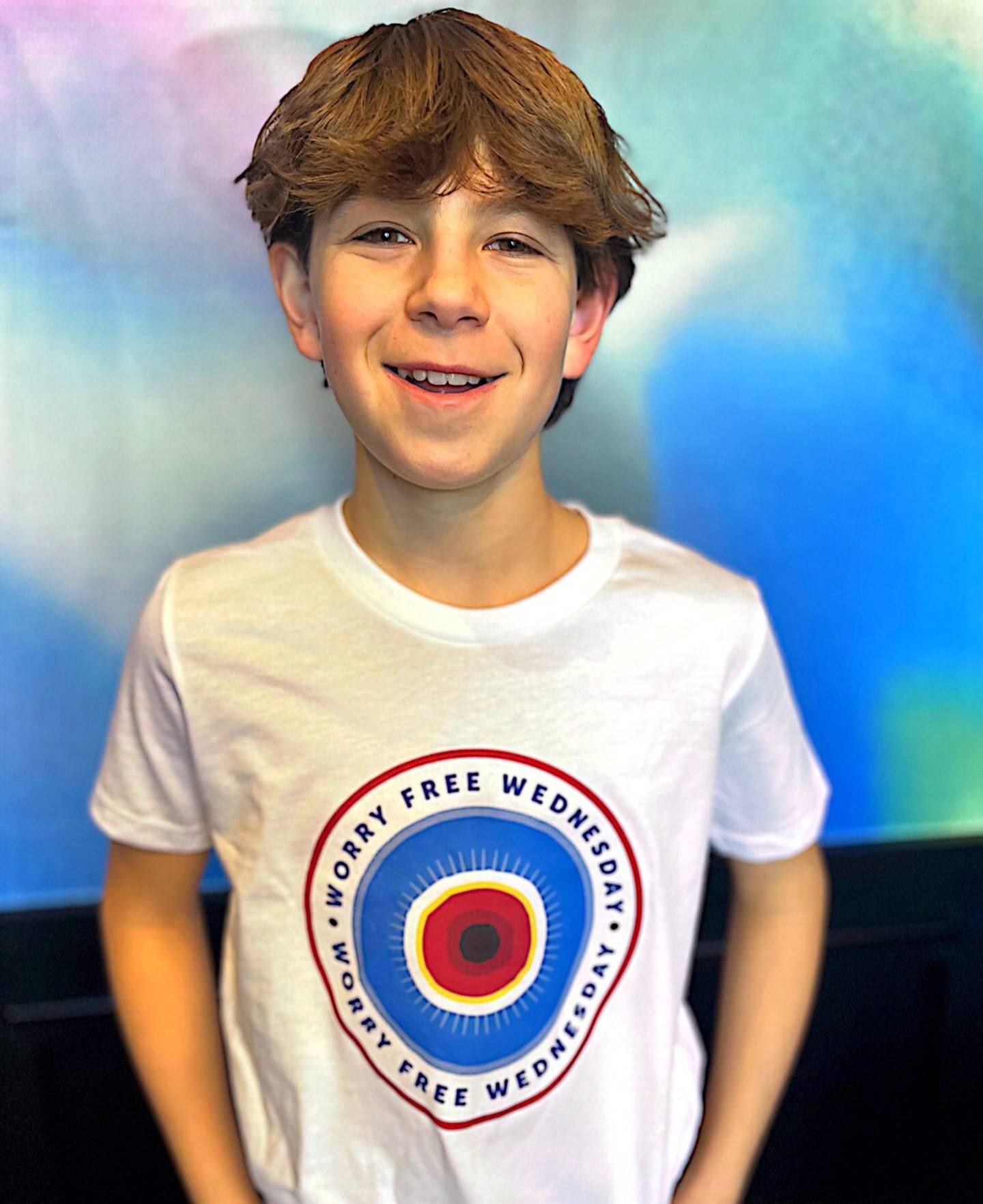 Mason Tepper, 11, of Deerfield, shows off a T-shirt he is selling to raise awareness for mental health.and funds for The Balance Project, an organization that supports mental and emotional wellness.