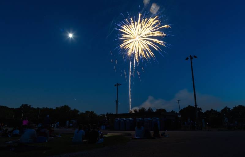 Spectators watch the “July 4th Fireworks” at Langum Park in St. Charles on Friday, July 4, 2025.
