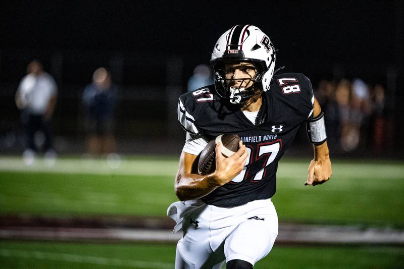 Plainfield Norths Jonnie Laurenti runs the ball during a game against Oswego East on Friday Sept. 12, 2025 at Plainfield North High School in Plainfield