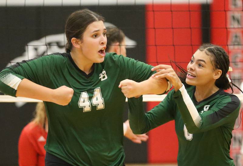 St. Bede's Hanna Waszowiak reacts with teammate Kijah Lucas after scoring a point against Henry-Senachwine on Tuesday, Oct. 21, 2025 at Henry-Senachwine High School.