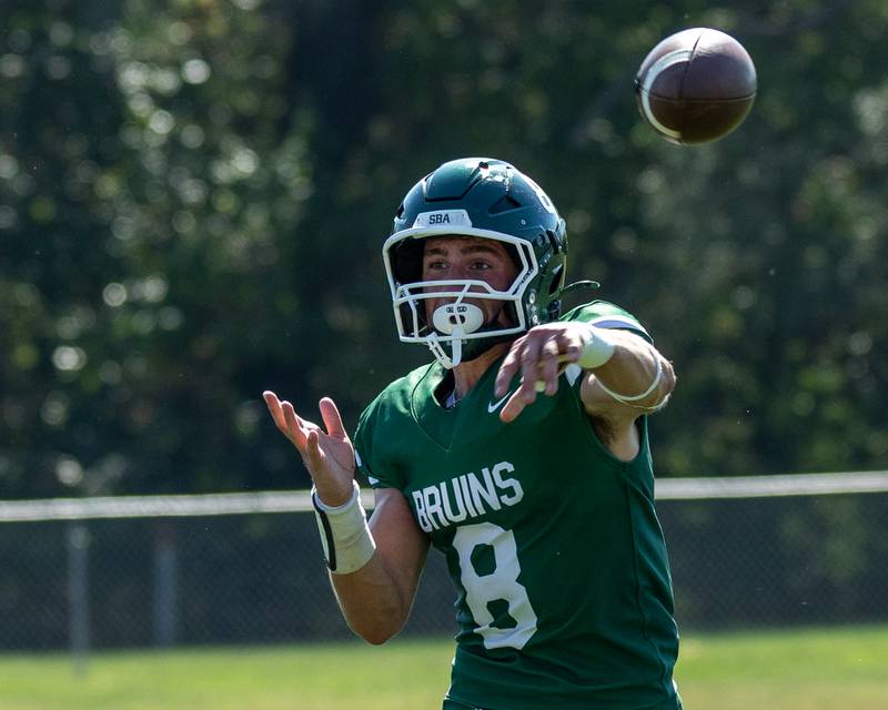 Gino Ferrari (8) of St. Bede throws football on Saturday, Oct. 4, 2025 at Captain Thomas J. Heitmann field in Peru.