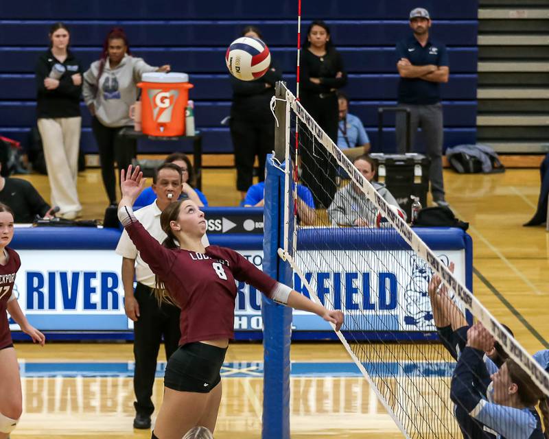 Lockport's Kyla Mitchell (8) spikes the ball during Class 4A Riverside-Brookfield Supersectional match between Lockport at Downers Grove South.  Nov 11, 2024  in Riverside.