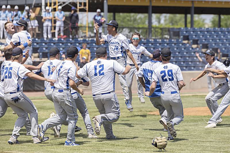 Newman celebrates their 3-2 supersectional baseball game against Chicago Hope Monday, May 29, 2023. Newman will play next week in Peoria for the class 1A state title.