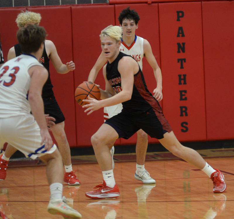 Fulton's Don Kramer (10) dribbles after stealing a pass against Morrison on Saturday, Dec. 30, 2023 at the Warkins Memorial Tournament at Erie High School.