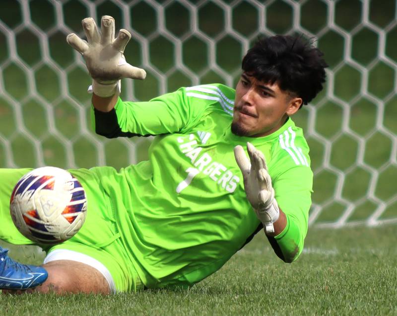 Dundee-Crown’s goalkeeper Manuel Hernandez makes a late save against St. Charles East in IHSA Class 3A Regional Championship soccer at Dundee-Crown High School in Carpentersville on Saturday, October 25, 2025.