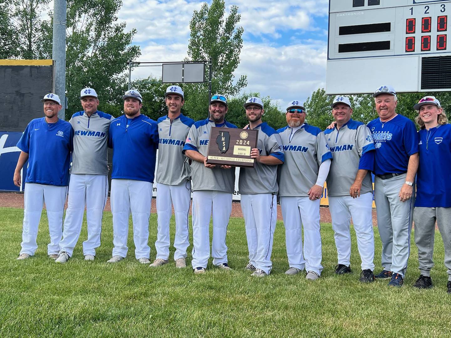 The Newman baseball coaching staff is pictured after winning the Class 2A supersectional title this past season. Left to right is coach Kenny Koerner, followed by assistants Ryan Decker, Nate Olson, Kyle Wolfe, John Kutz, Zach Rice, Nate Mason, Chad Miner, Skip Wolfe, and Grant Koerner. Not pictured are assistants Jace Murphy and Larry Ybarra.