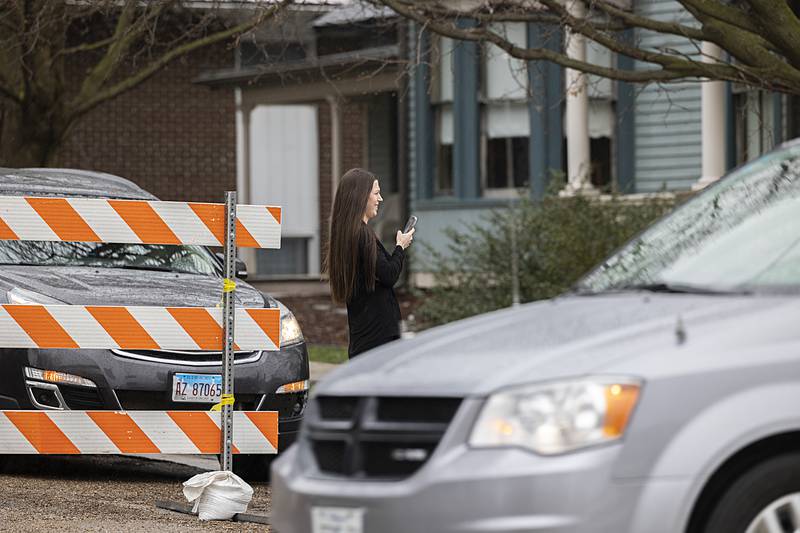 People lined the streets of Prophetstown on Thursday, April 4, 2024, as a procession of vehicles moves toward Riverside Cemetery to honor Jayden Hanson.