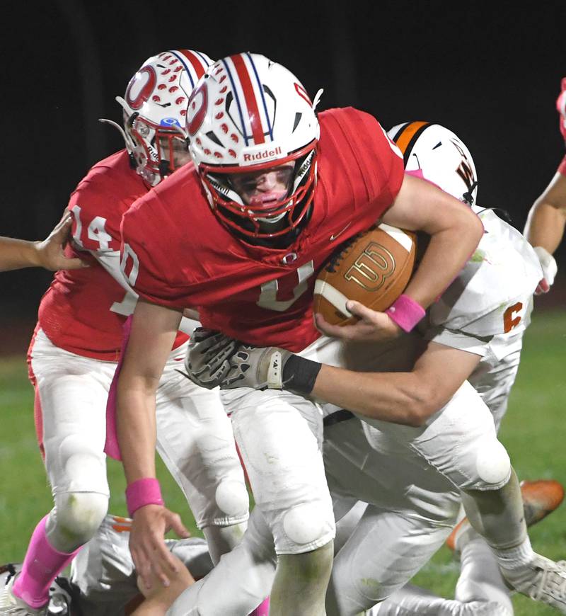 Oregon's Aiden Currier (0) runs with the ball against Winnebago on Friday, Oct. 17, 2025 at Landers-Loomis Field in Oregon.