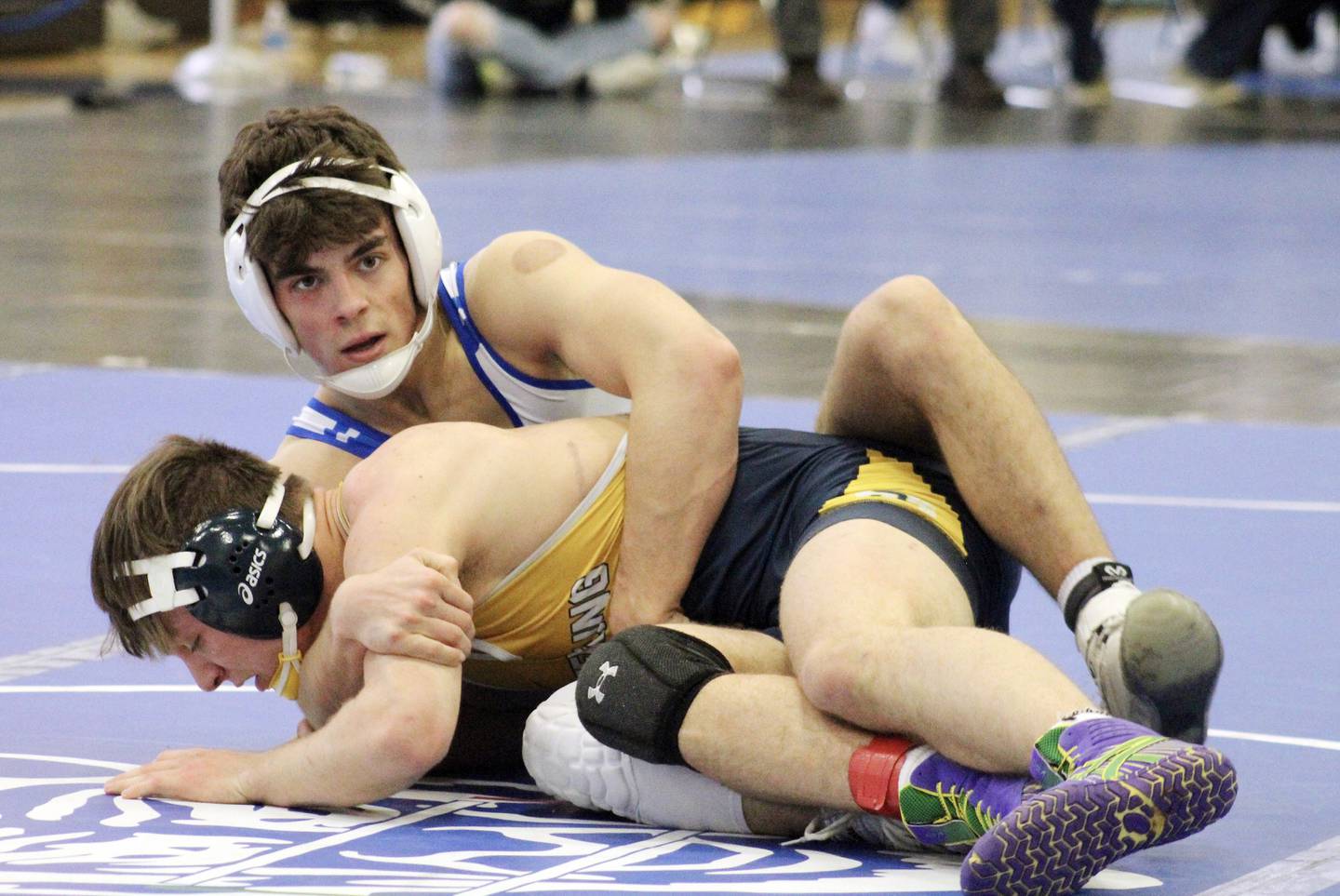 Sterling's Thomas Tate is controlled by Quincy's Owen Uppinghouse in the 160-pound title match at the Western Big 6 conference meet Saturday, Jan. 28, 2023. Uppinghouse took the win.