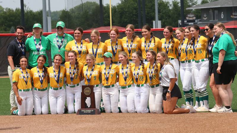 Members of the Providence Catholic softball team pose with the  Class 3A State Runner-Up trophy on Saturday, June 14, 2025 at the Louisville Slugger Sports Complex in Peoria.