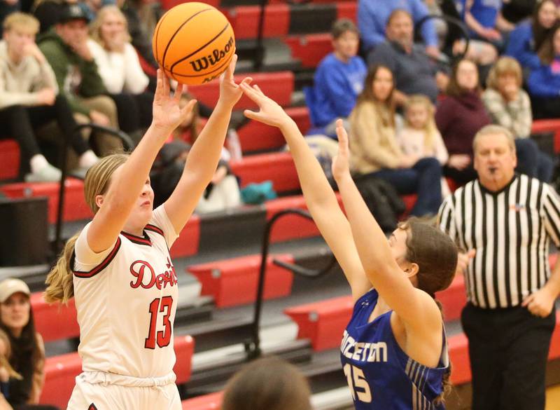 Hall's Caroline Morris sinks this game-winning shot over Princeton's Olivia Mattingly on Monday, Jan. 6, 2025 at Hall High School.