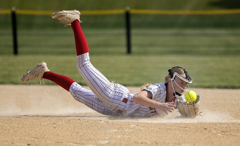 Fulton’s Brooklyn Vogel makes the stop but can’t corral the throw against Orangeville Tuesday, May 26, 2026, at the Eastland Class 1A softball sectional quarterfinal.