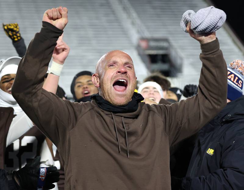 Mount Carmel head coach Jordan Lynch celebrates Wednesday, Dec. 3, 2025, after their win over Oswego in the IHSA Class 8A state chamionship game in Huskie Stadium at Northern Illinois University in DeKalb.