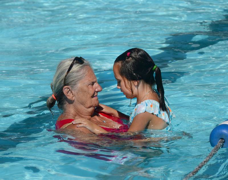 Alivia Stram, 6, and her mom, Avis, cooled off at the Polo Pool on Monday, July 28, 2025.