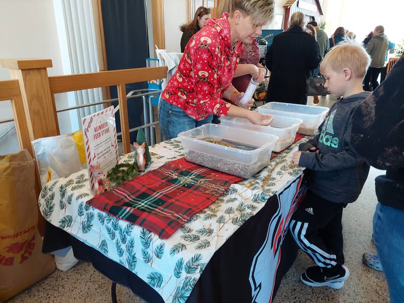 Children were given reindeer food Saturday, Nov. 18, 2023, to leave out on Christmas Eve during the Christmas Walk at the Prouty Building in Princeton.