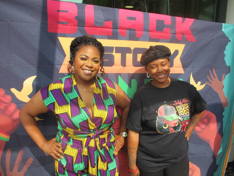 Jermissia Evans of Joliet (left) and Isha Amor of Maywood organized the Juneteenth celebration held at the Joliet Area Historical Museum on Sunday, June 18.