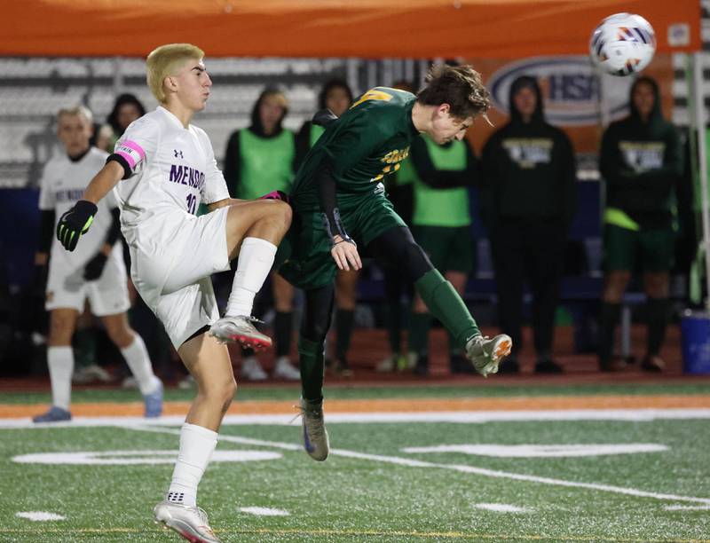 Coal City's Creed Macaluso heads the ball in front of Mendota's Johan Cortez Thursday, Nov. 6, 2025, during their Class 1A state semifinal game at Hoffman Estates High School.