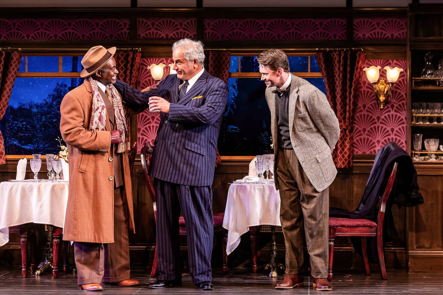 Sean Blake (from left), Keith Kupferer and Sam Boeck in a scene from "Murder on the Orient Express" at Drury Lane Theatre in Oakbrook Terrace.