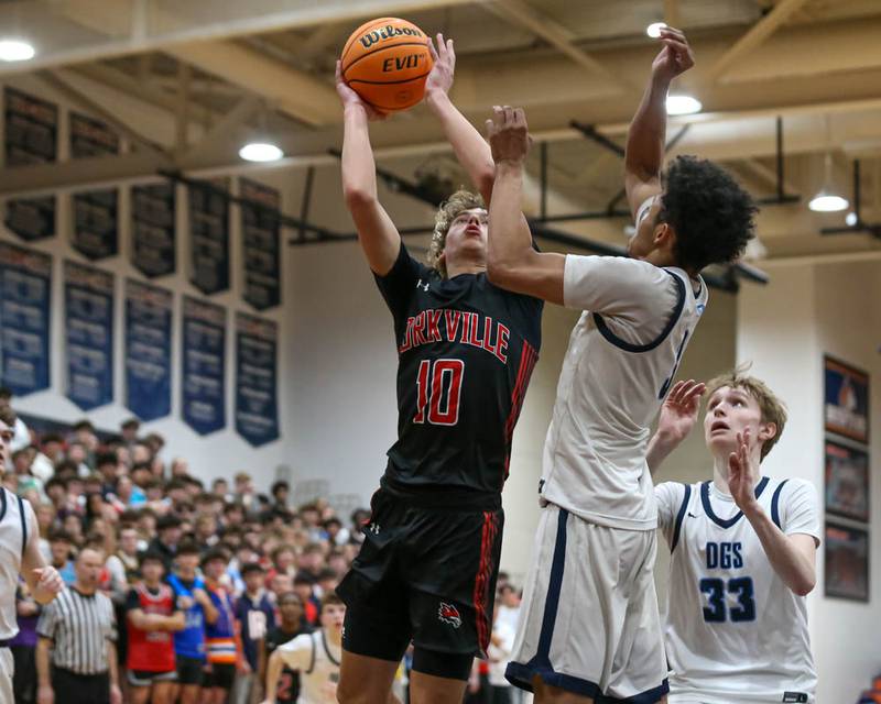 Yorkville's Graham Martinson (10) puts up a shot during their Class 4A Naperville North Regional final basketball game between Yorkville at Downers Grove South, Feb 27, 2026 in Naperville.