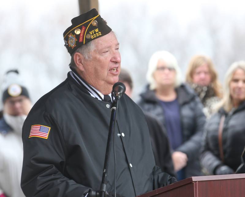 Jerry Loebach of Peru VFW Post 8232 talks about his second-cousin who was a casualty in Pearl Harbor during the 44th annual Pearl Harbor parade and memorial ceremony on Saturday, Dec. 2, 2023 in Peru.