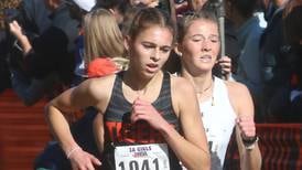 Crystal Lake Central’s Hadley Ferrero helps opponent finish at IHSA state meet