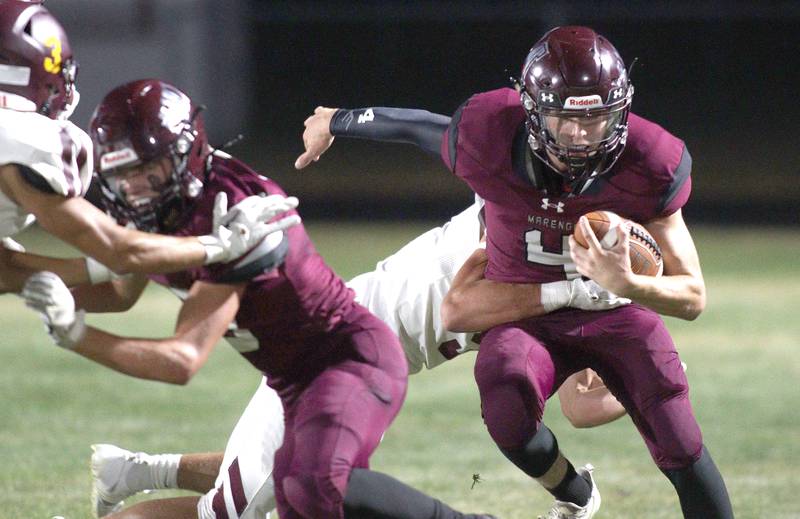 Marengo’s Mason Lampe runs the ball against Richmond-Burton in varsity football at Rod Poppe Field in Marengo Thursday night.