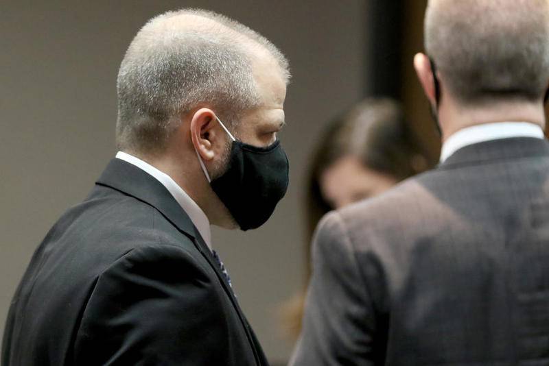 Former DCFS supervisor Andrew Polovin, left, leaves Judge Robert Wilbrandt's courtroom with attorney Matthew McQuaid, right, at the Michael J. Sullivan Judicial Center, formerly known as the McHenry County Courthouse, on Thursday, Oct. 29, 2020, in Woodstock.  Polovin directly supervised case worker Carlos Acosta, who was overseeing the AJ Freund case prior to the 5-year-old's murder.