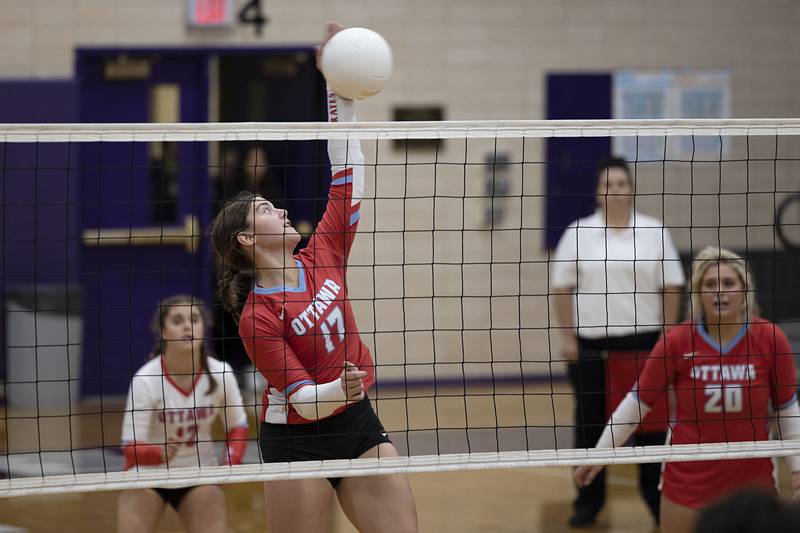 Ottawa’s Olivia Evola spikes the ball in the regional semifinal Tuesday, Oct. 25, 2022 against Dixon.