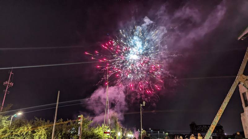 People gather near the Cass Street Bridge in Joliet for the fireworks show. The fireworks show was the culmination of the annual Independence Day celebration at the Billie Limacher Bicentennial Park Theatre  in Joliet.