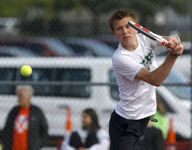 York’s Brennen Maxeiner returns the ball as he and his doubles partner, Nate Yu, compete in the Class 2A Boys State Tennis Tournament on Thursday, May 29, 2025, at Palatine High School.