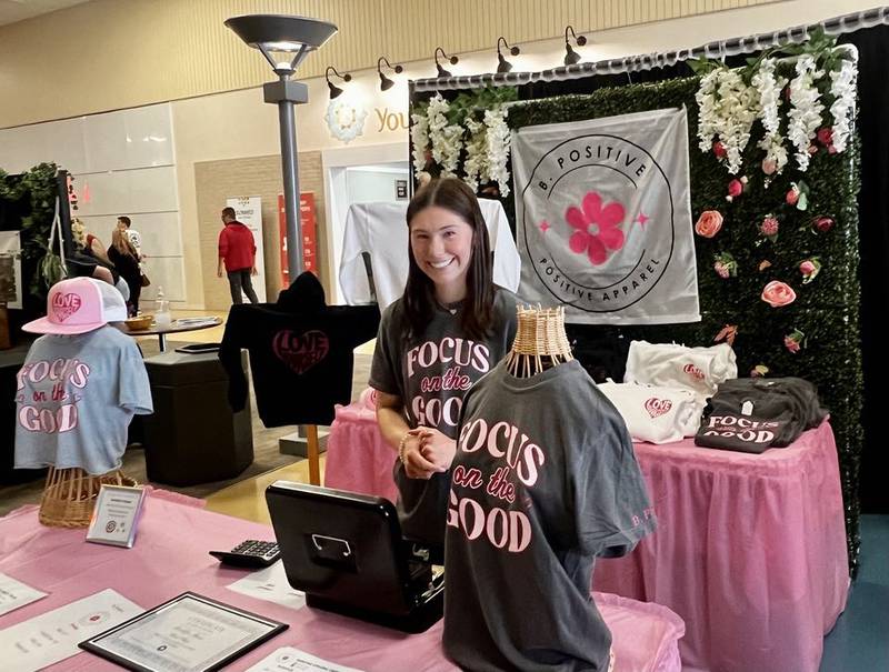 Fulton High School junior Brooklyn Thoms greets customers at her business, B. Positive, in Sterling's Northland Mall at the Whiteside Area Career Center's CEO program student trade show on April 23, 2025.