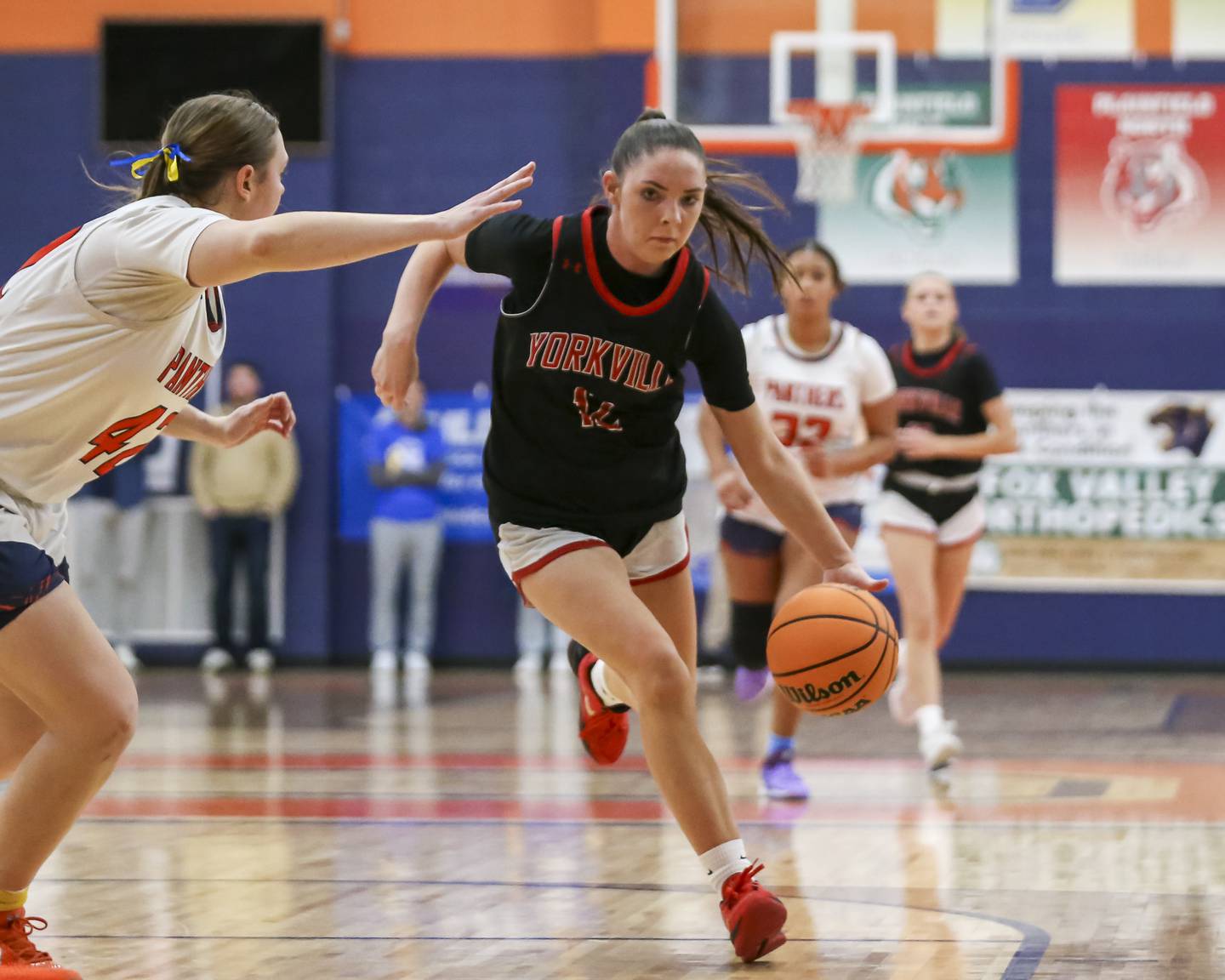 Yorkville's Hayden Hodges (12) drives down the lane during their basketball game between Yorkville at Oswego, Feb 7, 2026 in Oswego.