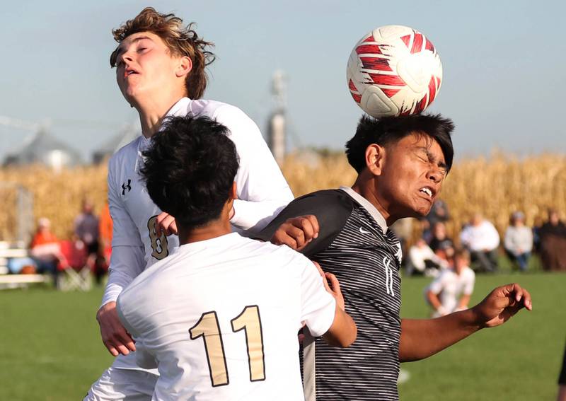 Sycamore's Tyler Hiland (left) and Kaneland's Abe Paulino go up for a header during their game Monday, Oct. 7, 2024, at Kaneland High School in Maple Park.